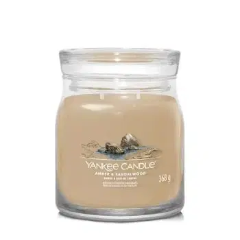 Yankee Candle sviečka Stredná Amber & Sandalwood