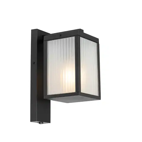 Vonkajšia nástenná lampa čierna s rebrovaným sklom a senzorom súmraku - Charlois